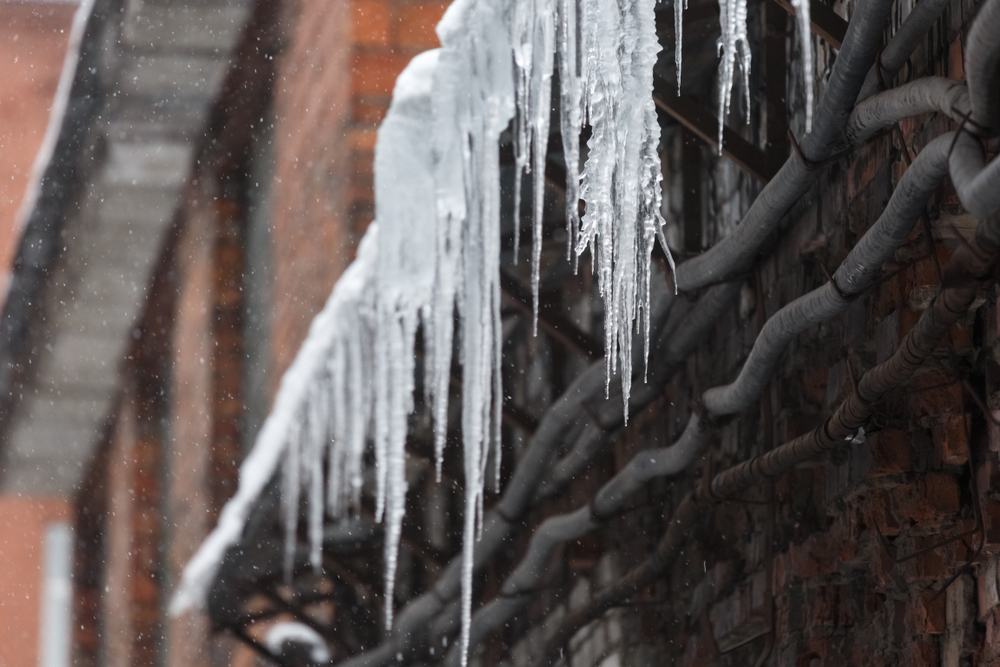 Snow And Ice On A Small Business Roof