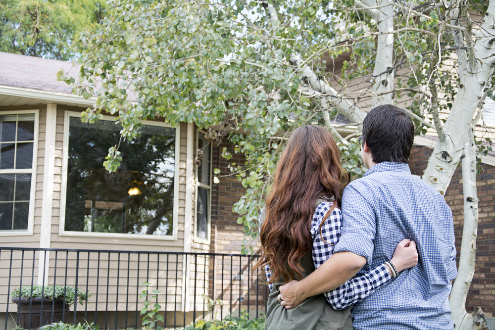 Couple Looking At Their New Home